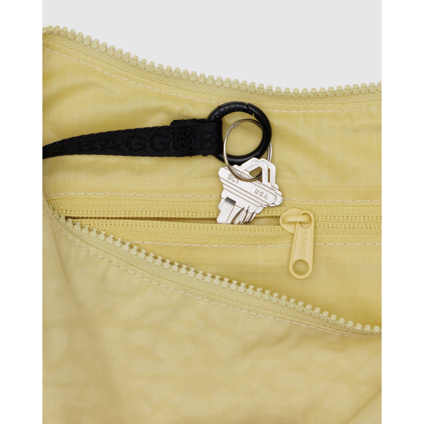 MEDIUM NYLON CRESCENT BAG - BUTTER