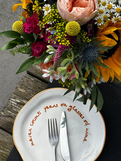 SLOGAN PLATE - "NEVER COUNT YEARS OR GLASSES OF WINE"